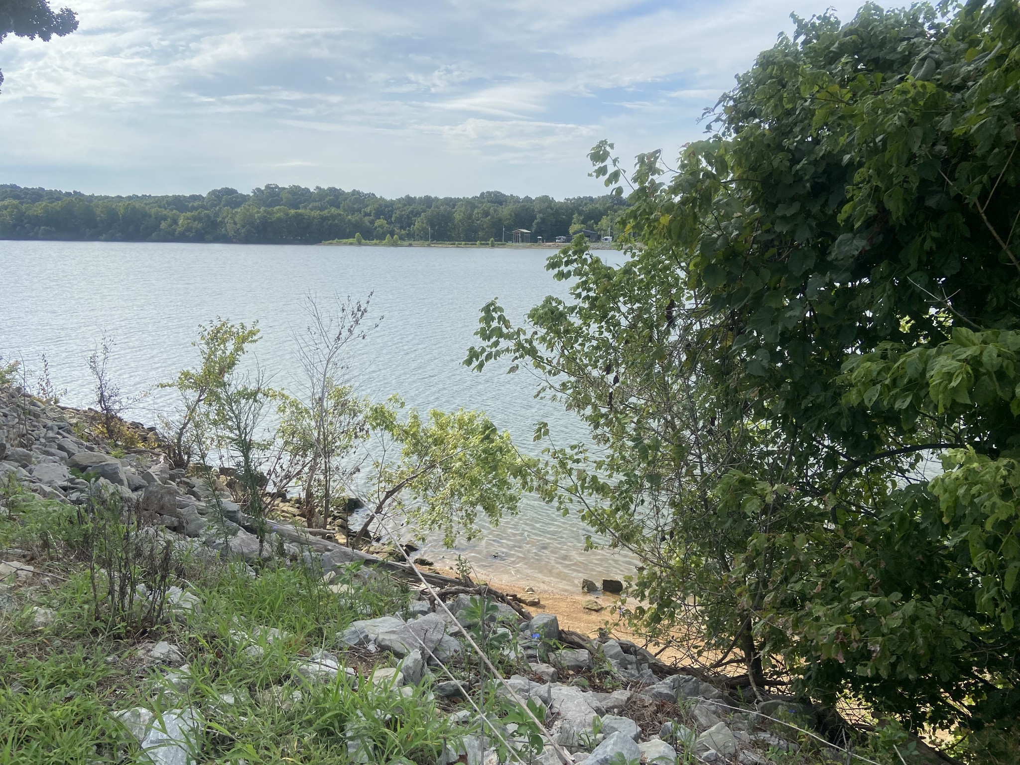 0 Yarbro Landing Lane Decaturville, TN 38329 - Photo 3 of 9 a view of a lake from a yard