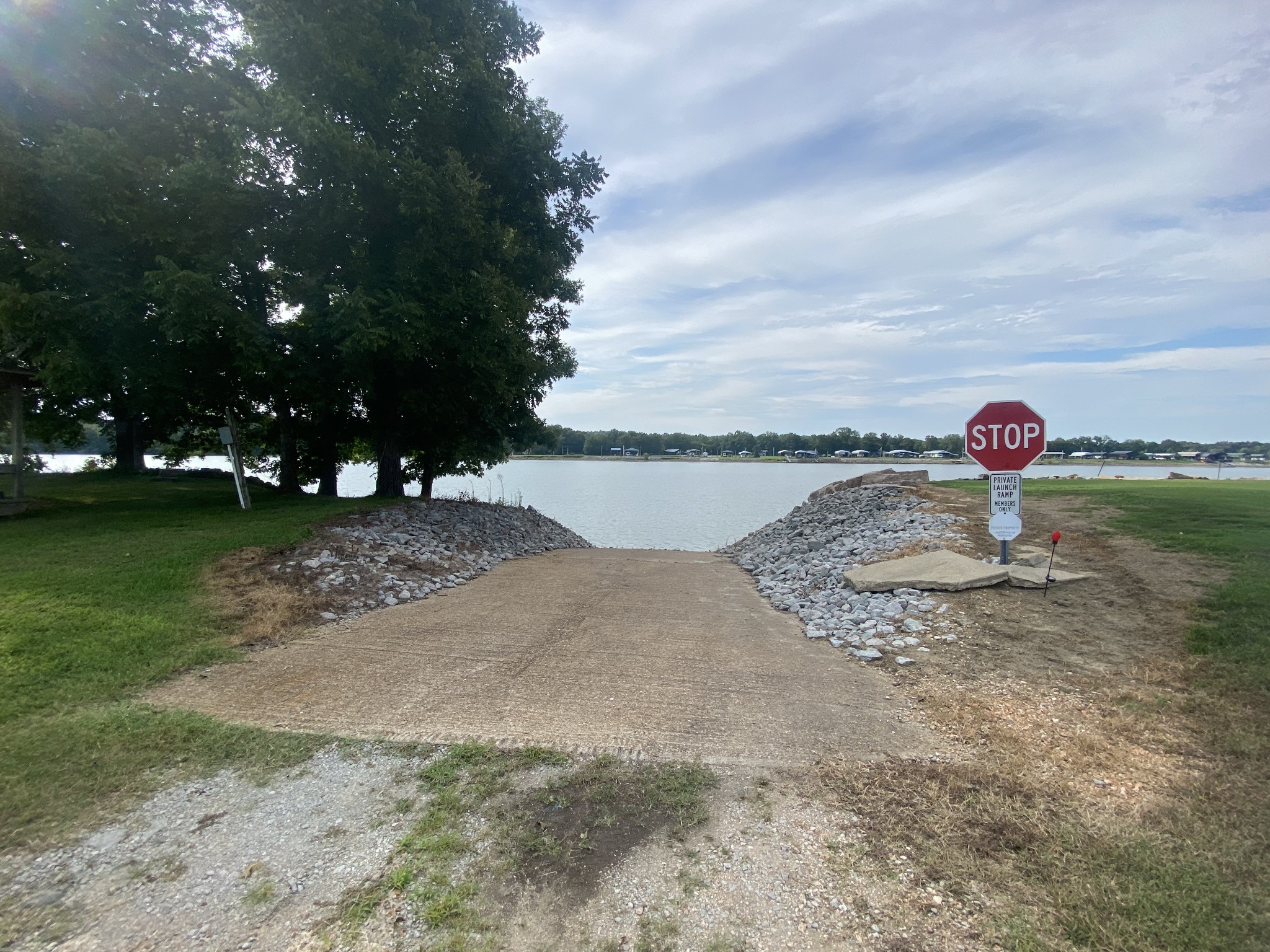 0 Yarbro Landing Lane Decaturville, TN 38329 - Photo 8 of 9 a view of a lake with a nearby beach
