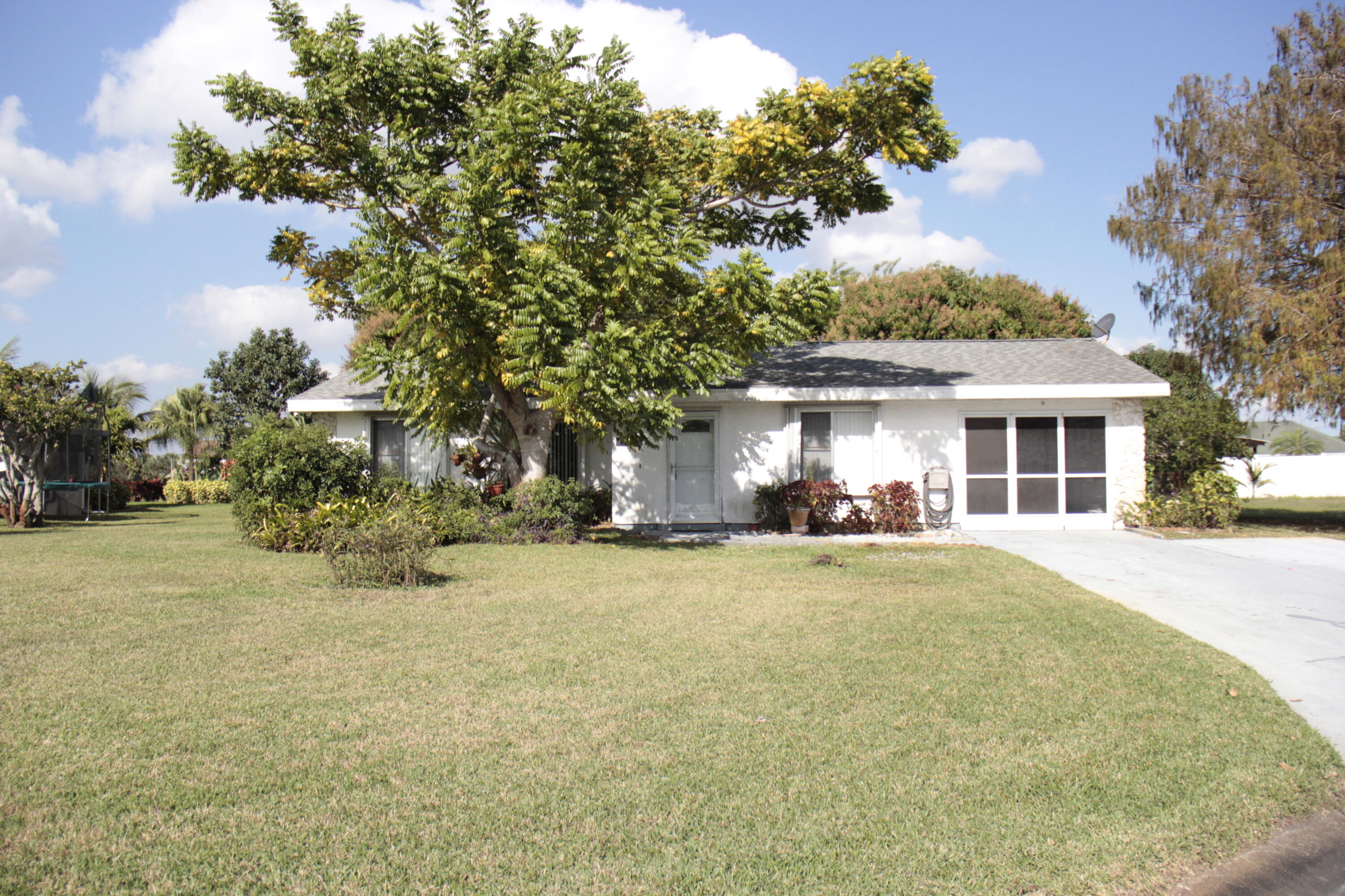 411 Southwest Ruffner Court Port St. Lucie, FL 34953 - Photo 1 of 28 Newer Roof, AC