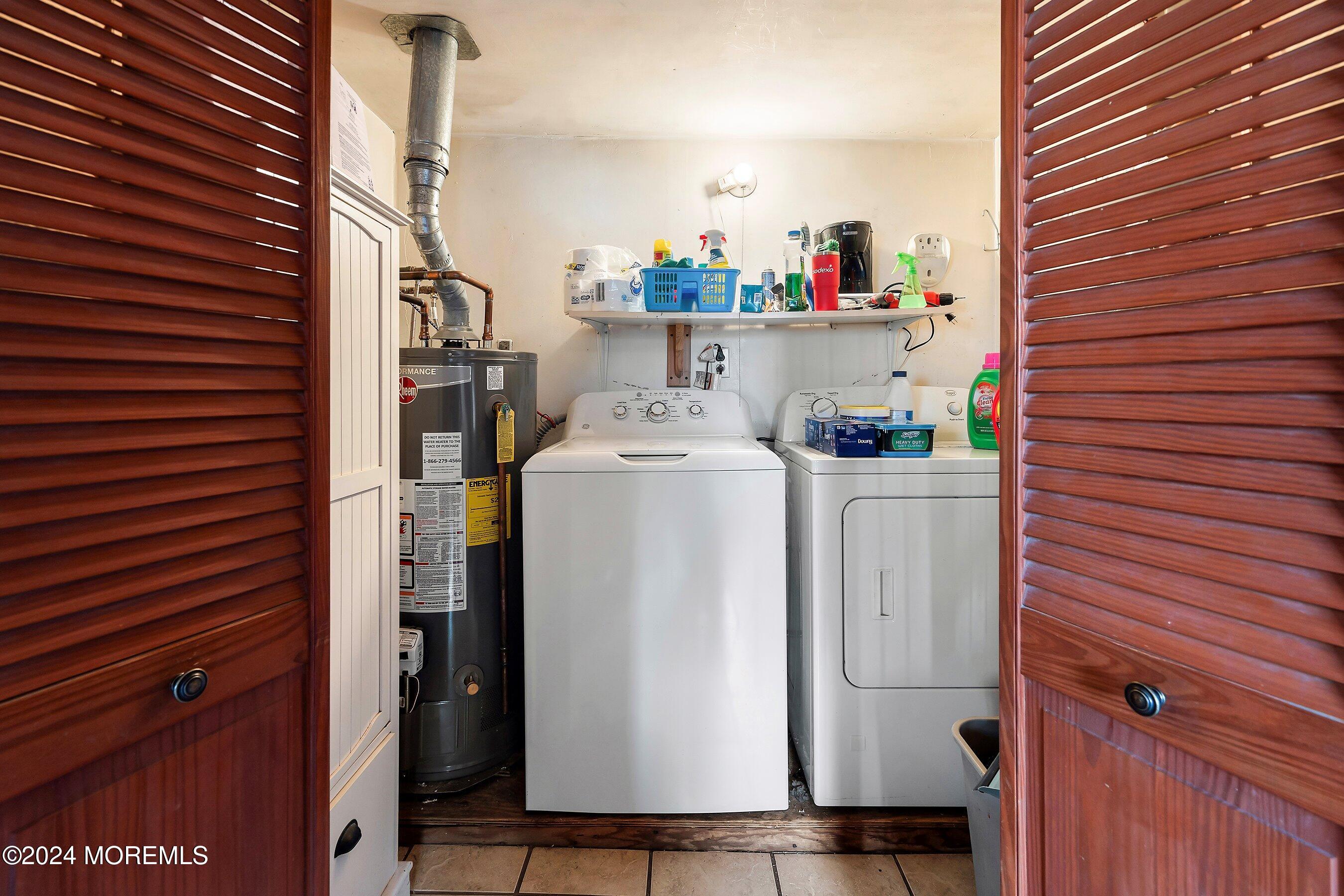 170 Cherry Quay Road Brick, NJ 08723 - Photo 18 of 28 a utility room with dryer and washer