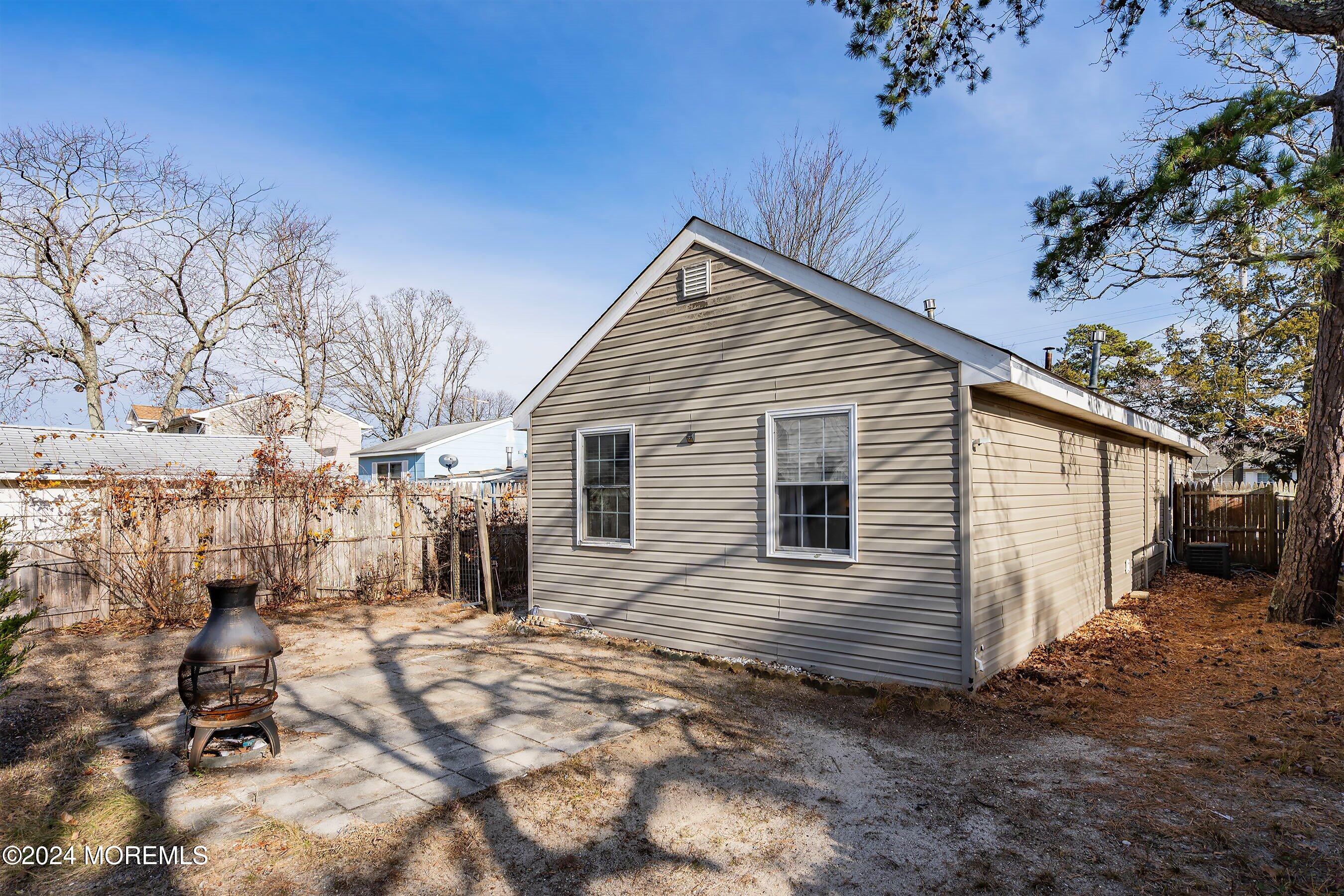 170 Cherry Quay Road Brick, NJ 08723 - Photo 22 of 28 a view of a house with a yard