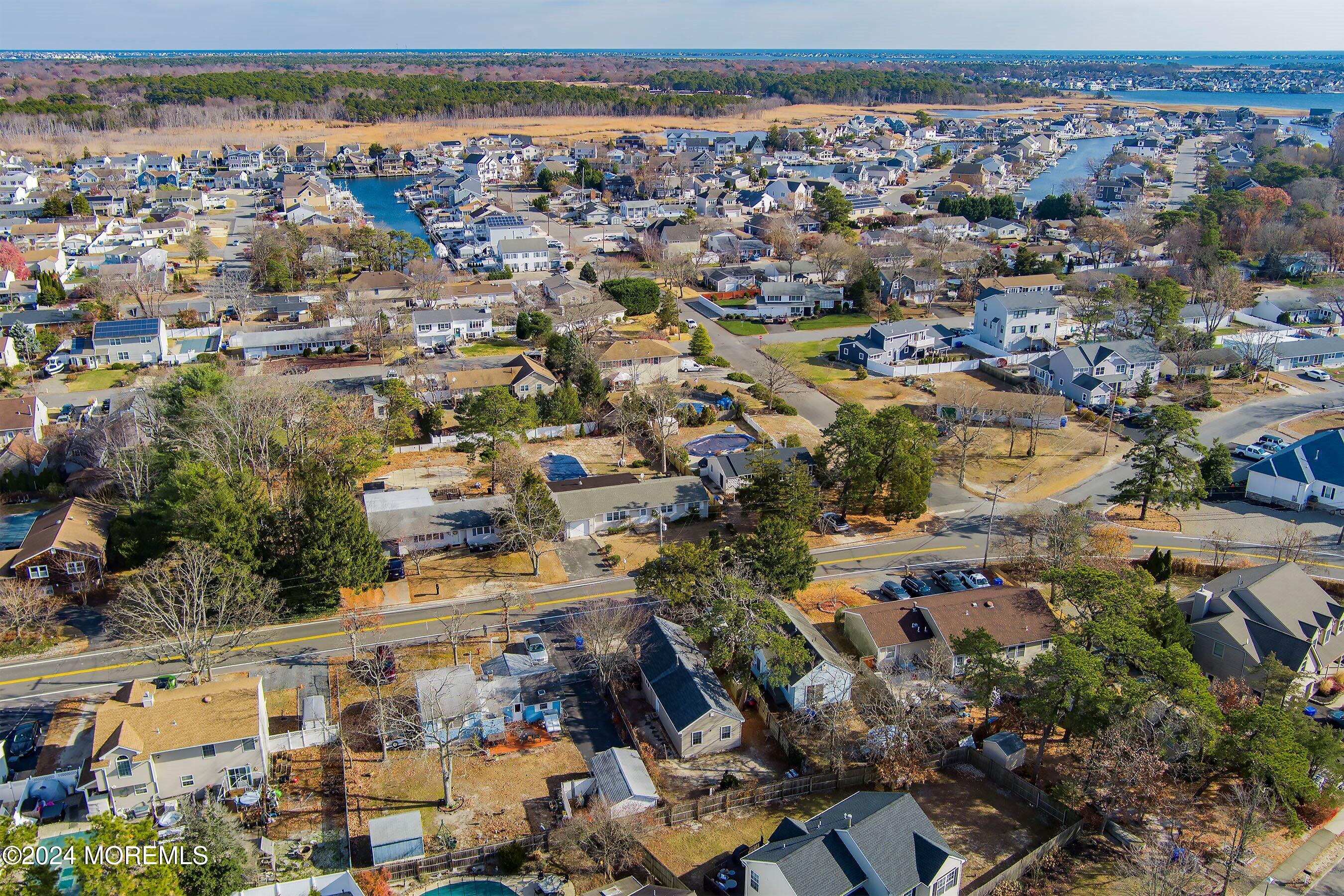 170 Cherry Quay Road Brick, NJ 08723 - Photo 25 of 28 an aerial view of residential building and parking space