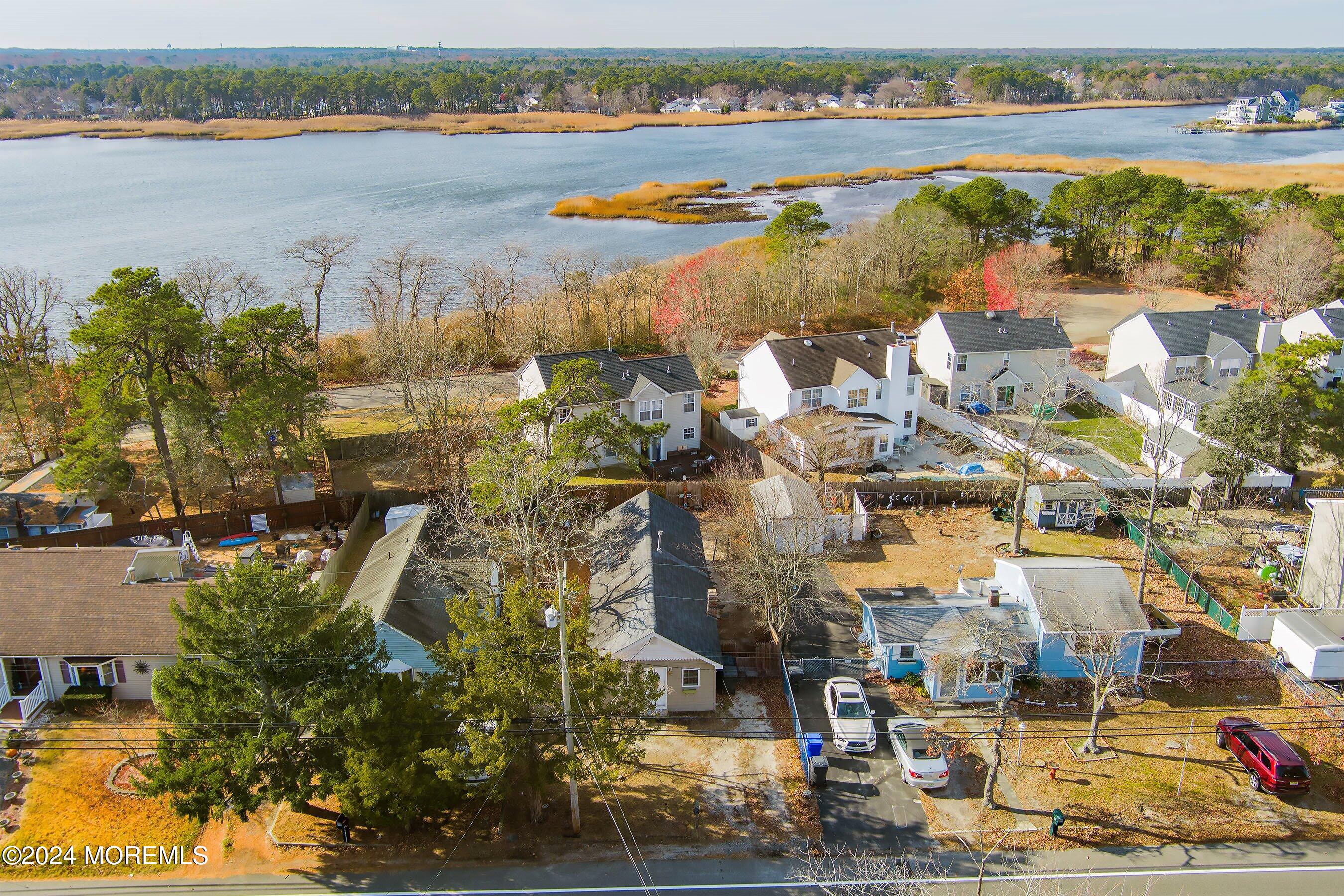 170 Cherry Quay Road Brick, NJ 08723 - Photo 28 of 28 an aerial view of residential houses with outdoor space and river