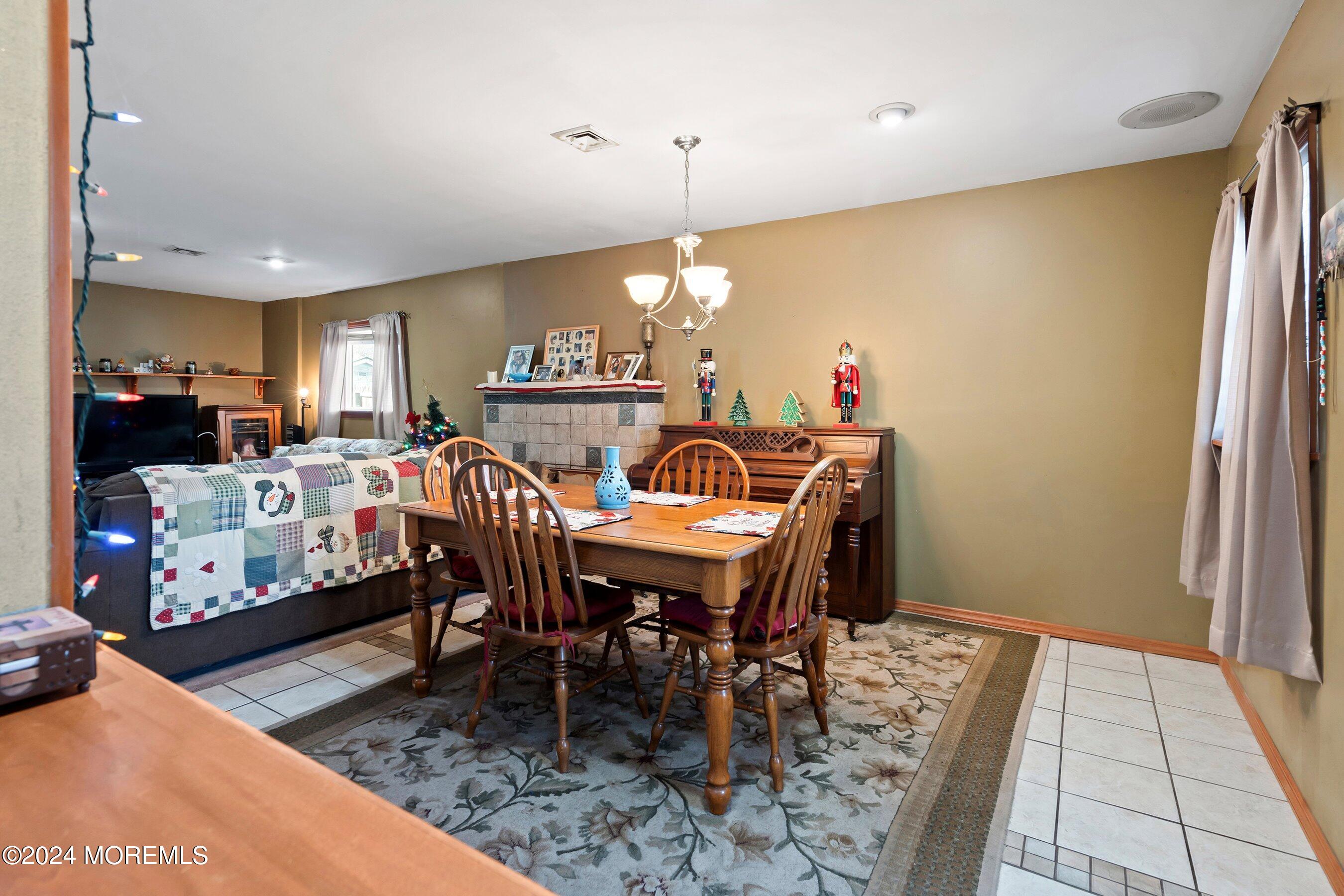 170 Cherry Quay Road Brick, NJ 08723 - Photo 7 of 28 a view of a dining room with furniture window and wooden floor