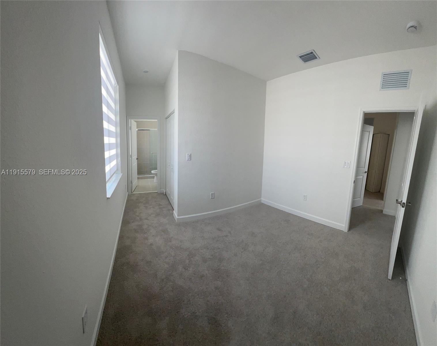 1455 Southeast 6th Terrace Homestead, FL 33034 - Photo 10 of 16 a view of hallway with livingroom
