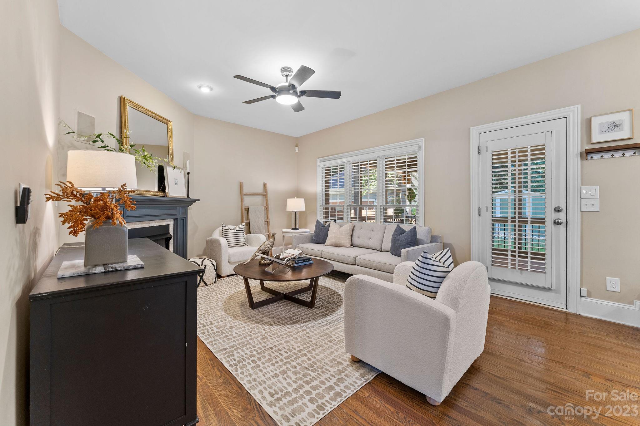 916 Millbrook Road Charlotte, NC 28211 - Photo 3 of 41 a living room with furniture and wooden floor
