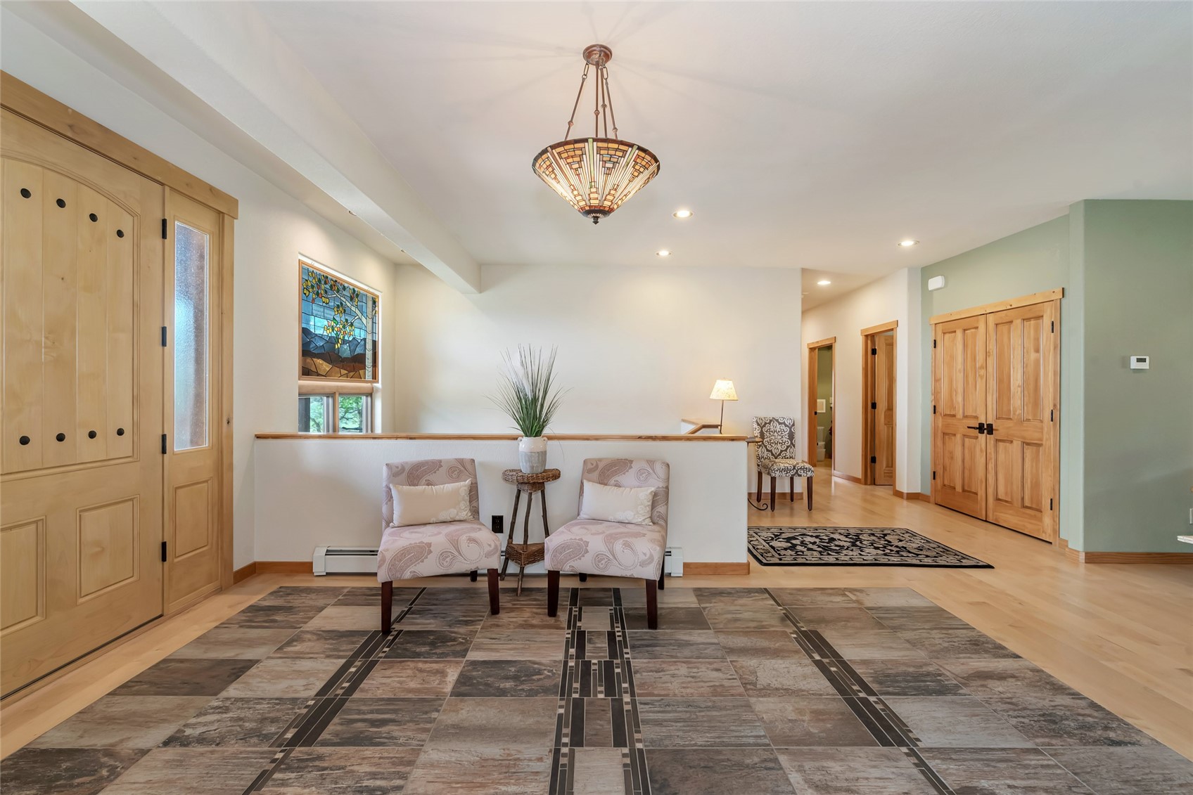 31485 Deerwood Ranch Road Steamboat Springs, CO 80487 - Photo 15 of 49 a very nice looking dining room with a rug