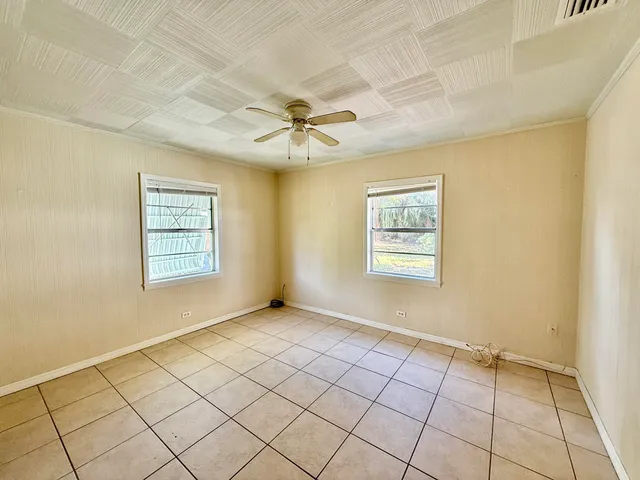 a view of an empty room and window