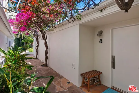 a backyard of a house with seating space