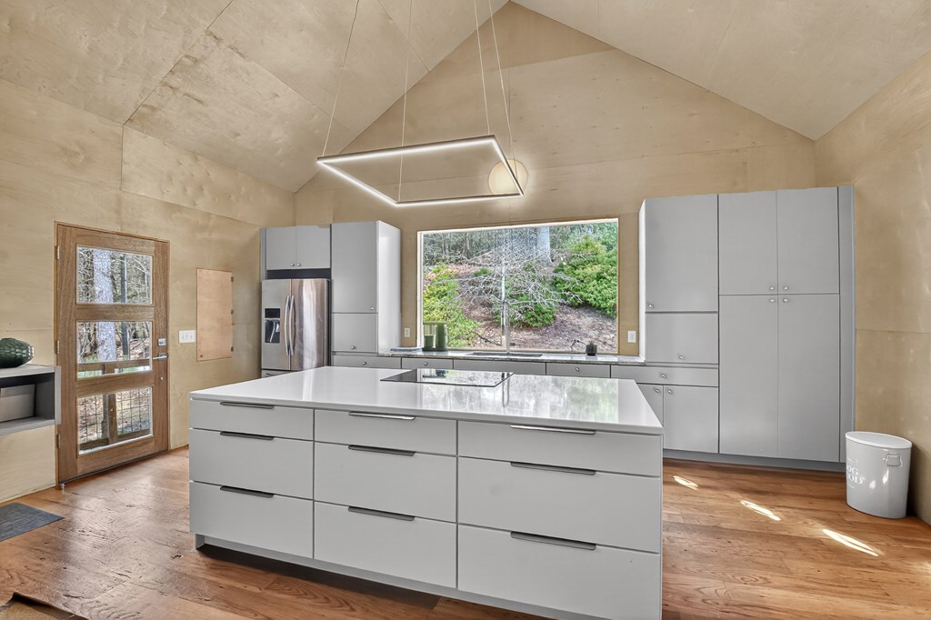 175 Big Creek Road Cherry Log, GA 30522 - Photo 12 of 40 a kitchen with stainless steel appliances granite countertop a stove and a white cabinets