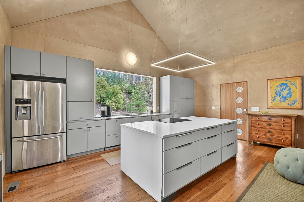 175 Big Creek Road Cherry Log, GA 30522 - Photo 3 of 40 a kitchen with a sink cabinets stainless steel appliances and a window