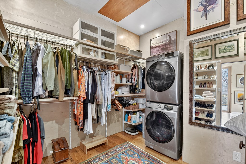 175 Big Creek Road Cherry Log, GA 30522 - Photo 32 of 40 a view of walk in closet with clothes and shoes