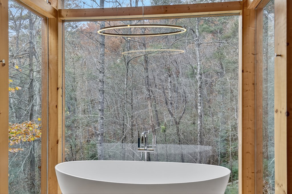 175 Big Creek Road Cherry Log, GA 30522 - Photo 33 of 40 a bathroom with a shower and a sink