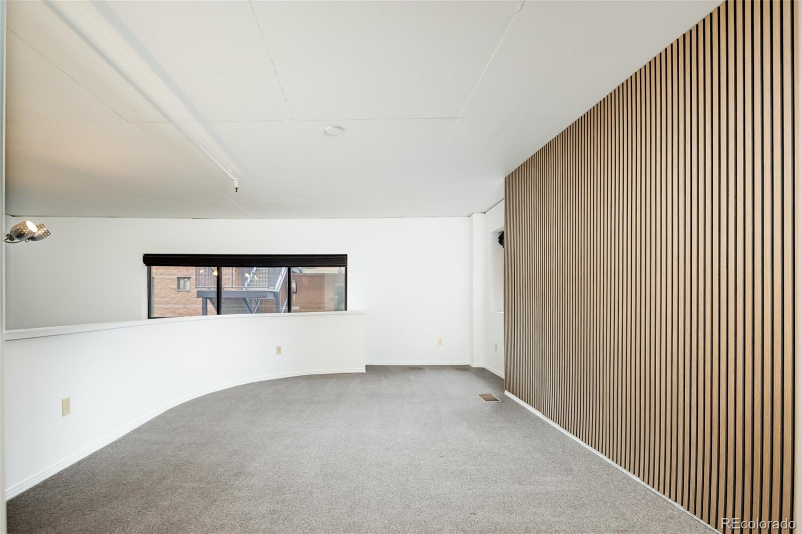 930 Acoma Street, Unit 212 Denver, CO 80204 - Photo 21 of 35 a view of an empty room