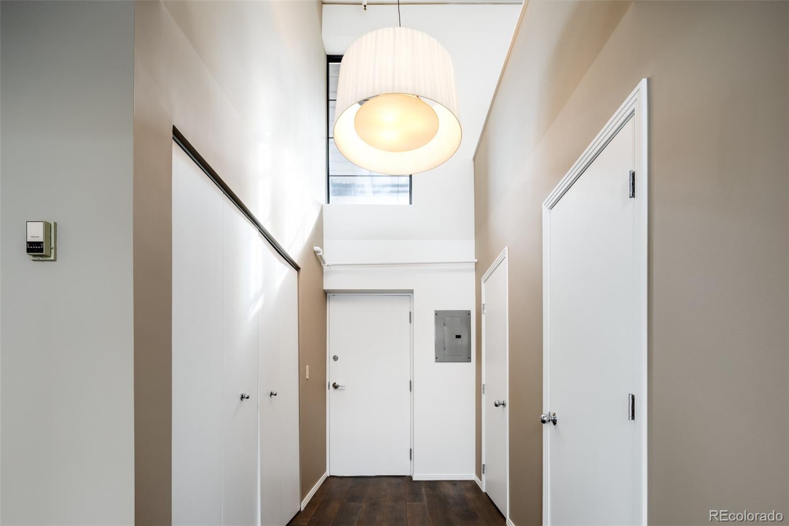 930 Acoma Street, Unit 212 Denver, CO 80204 - Photo 30 of 35 a bathroom with a sink and a mirror