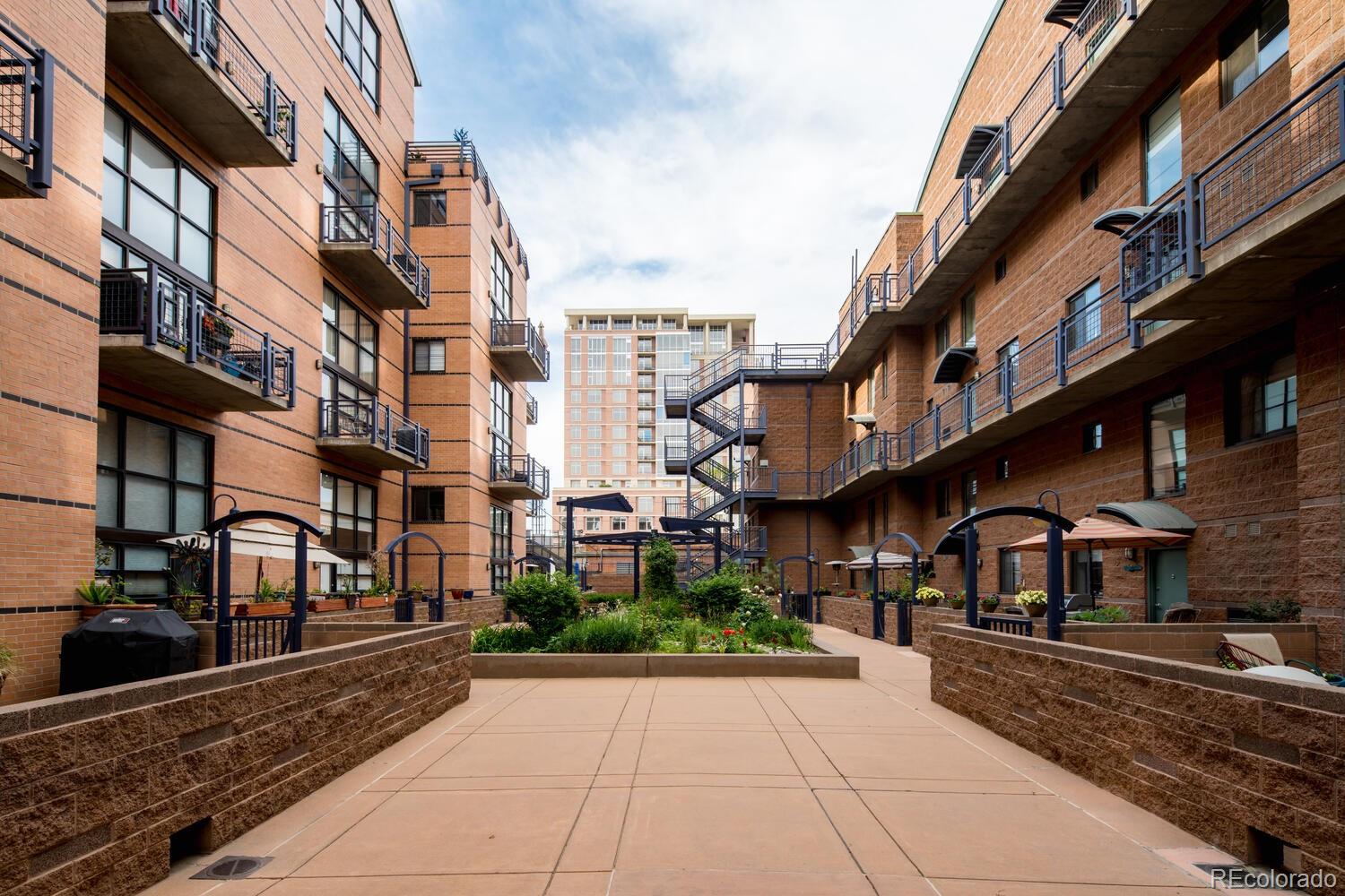 930 Acoma Street, Unit 212 Denver, CO 80204 - Photo 35 of 35 a front view of a multi story building