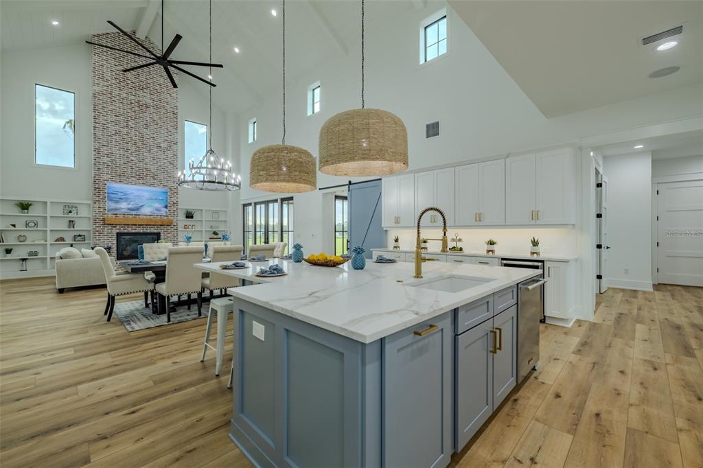 3515 Powerline Road Lithia, FL 33547 - Photo 12 of 100 a kitchen with stainless steel appliances a sink stove and wooden cabinets