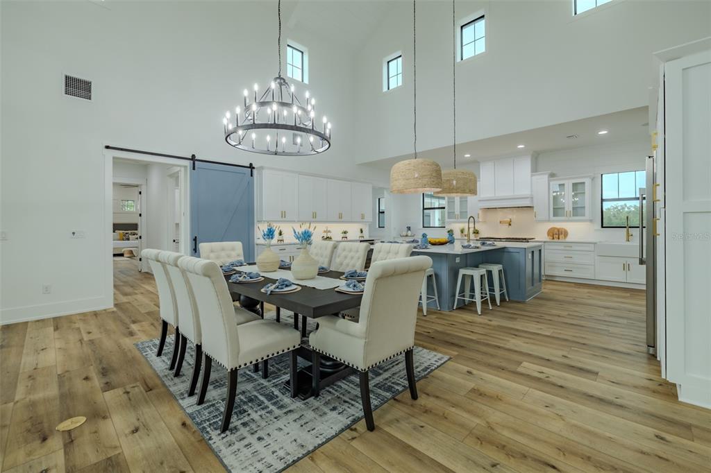 3515 Powerline Road Lithia, FL 33547 - Photo 20 of 100 a view of a dining room with furniture and wooden floor