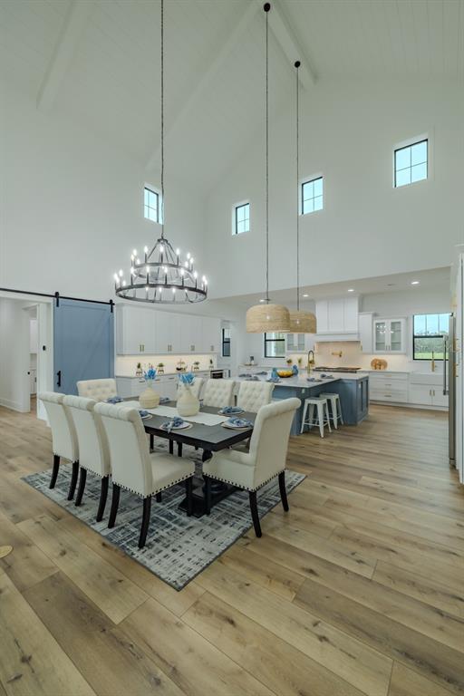 3515 Powerline Road Lithia, FL 33547 - Photo 24 of 100 a view of a dining room with furniture and chandelier