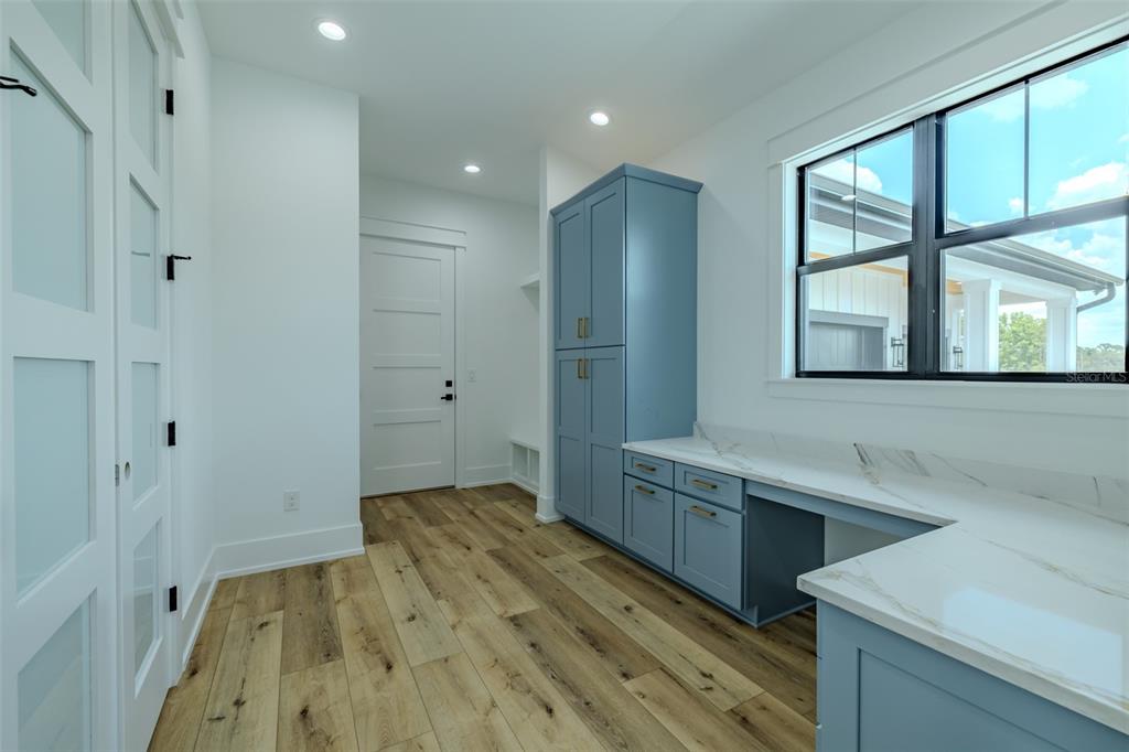 3515 Powerline Road Lithia, FL 33547 - Photo 33 of 100 a view of a kitchen with a sink and dishwasher refrigerator freezer