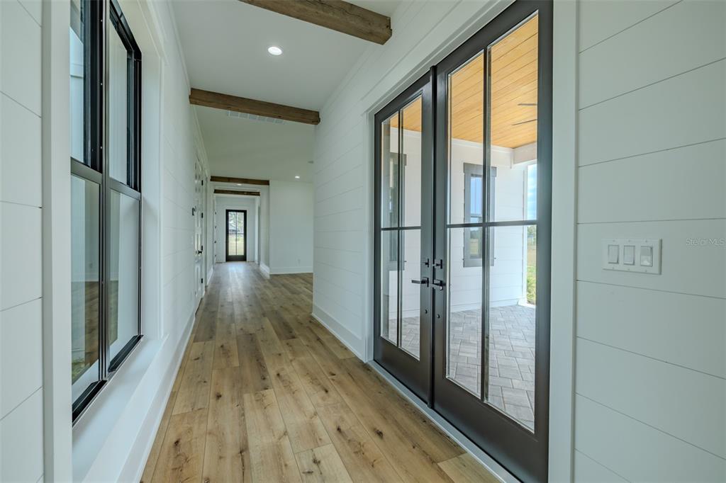 3515 Powerline Road Lithia, FL 33547 - Photo 41 of 100 a view of gallery with wooden floor