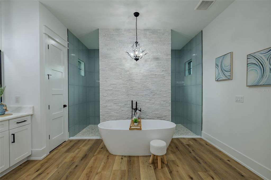 3515 Powerline Road Lithia, FL 33547 - Photo 51 of 100 a bathroom with a sink and a mirror