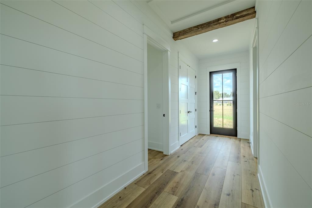 3515 Powerline Road Lithia, FL 33547 - Photo 73 of 100 a view of a room with wooden floor and a bathroom