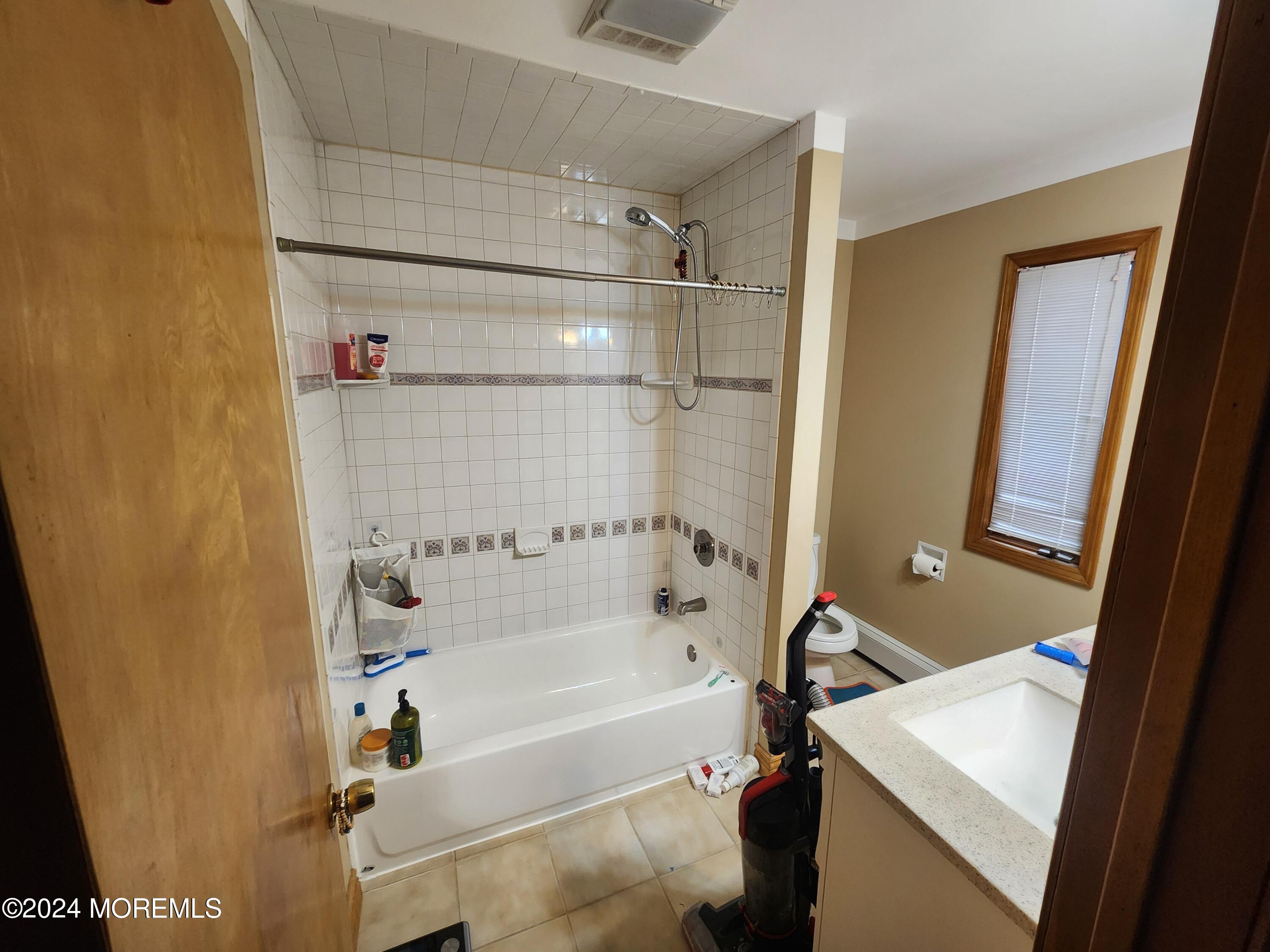 1850 Lakeside Drive South Forked River, NJ 08731 - Photo 16 of 54 a bathroom with a bathtub and a shower