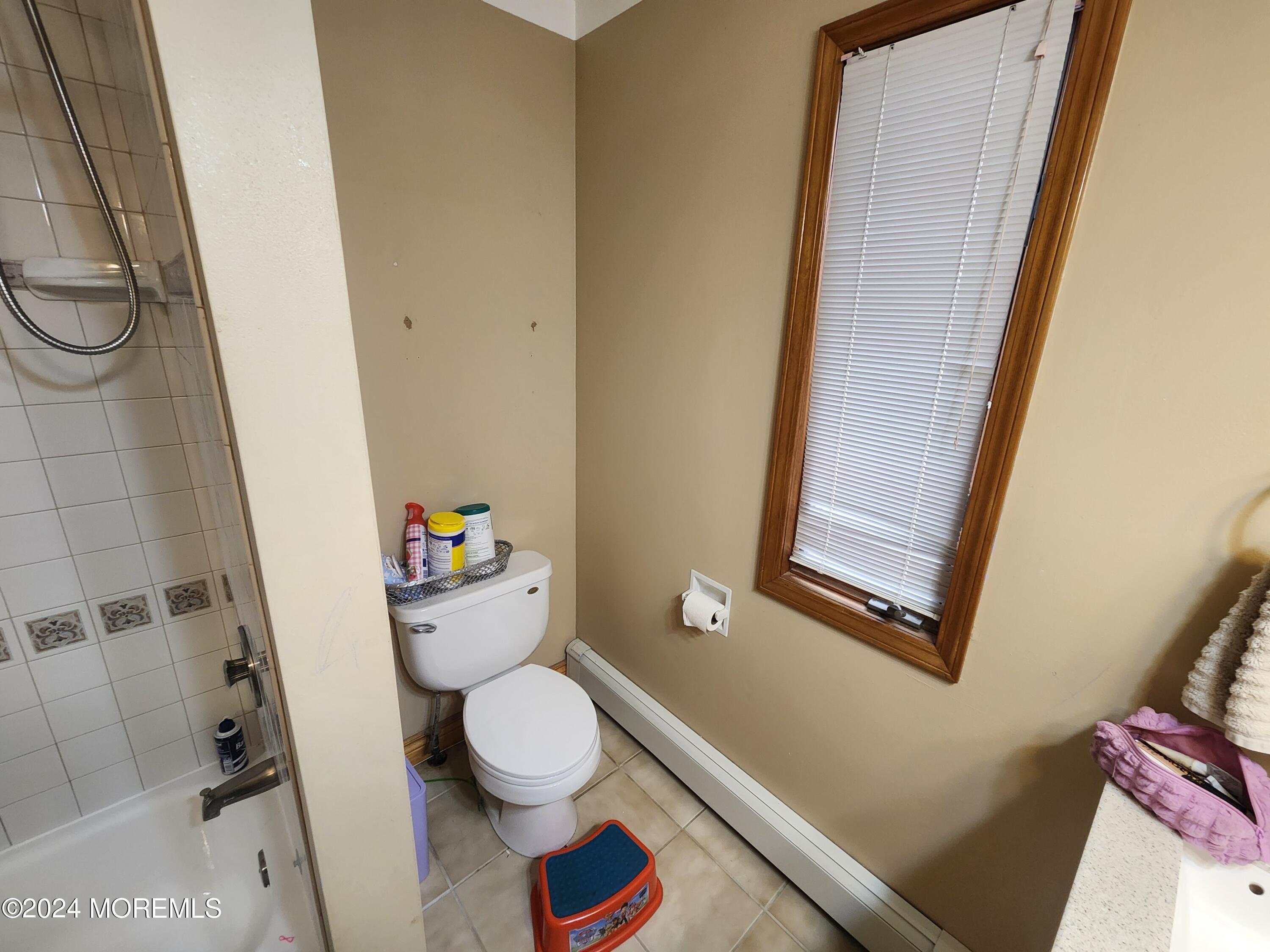 1850 Lakeside Drive South Forked River, NJ 08731 - Photo 18 of 54 a bathroom with a toilet and a shower