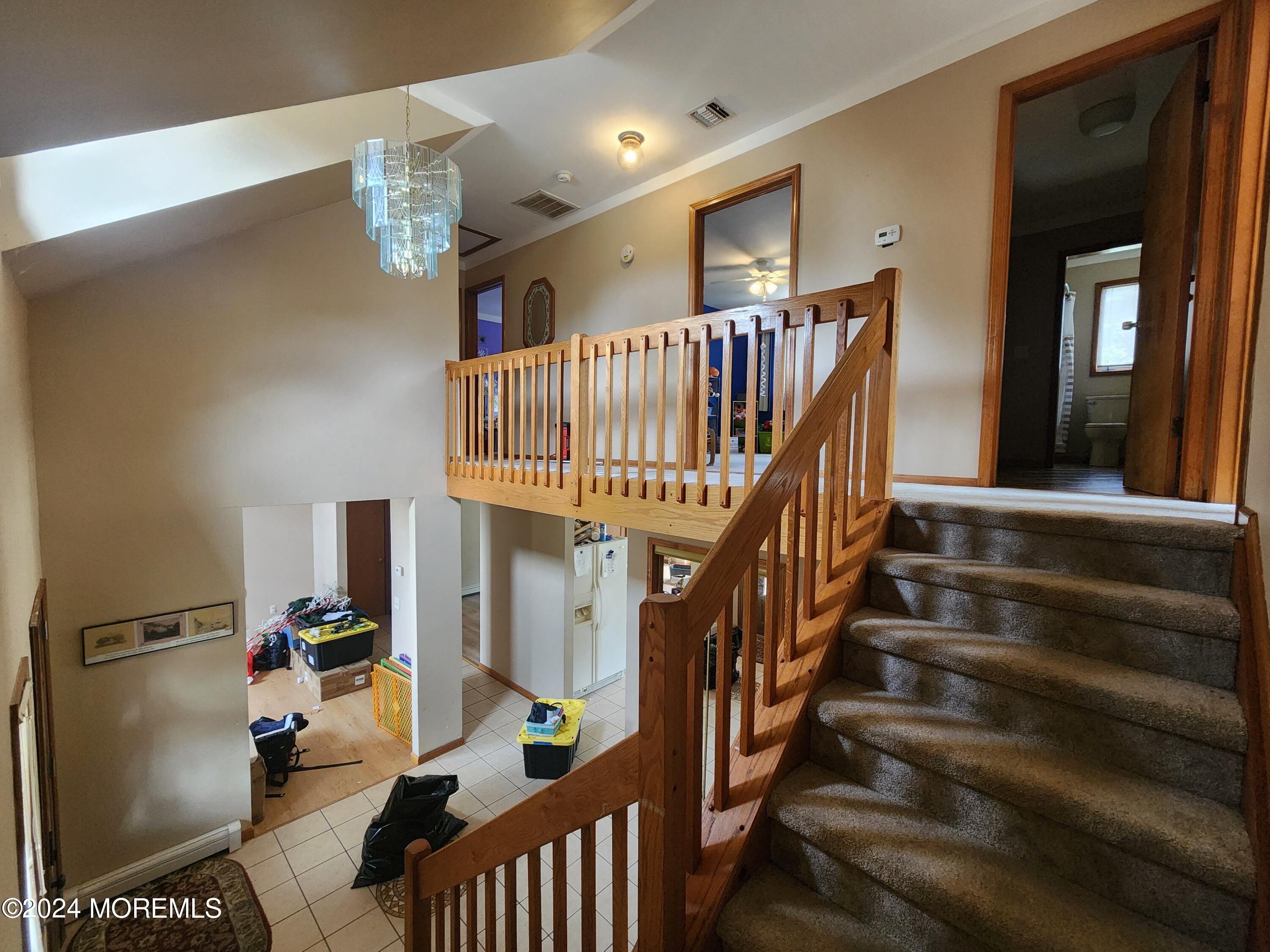 1850 Lakeside Drive South Forked River, NJ 08731 - Photo 19 of 54 a view of entryway livingroom and hall with wooden floor