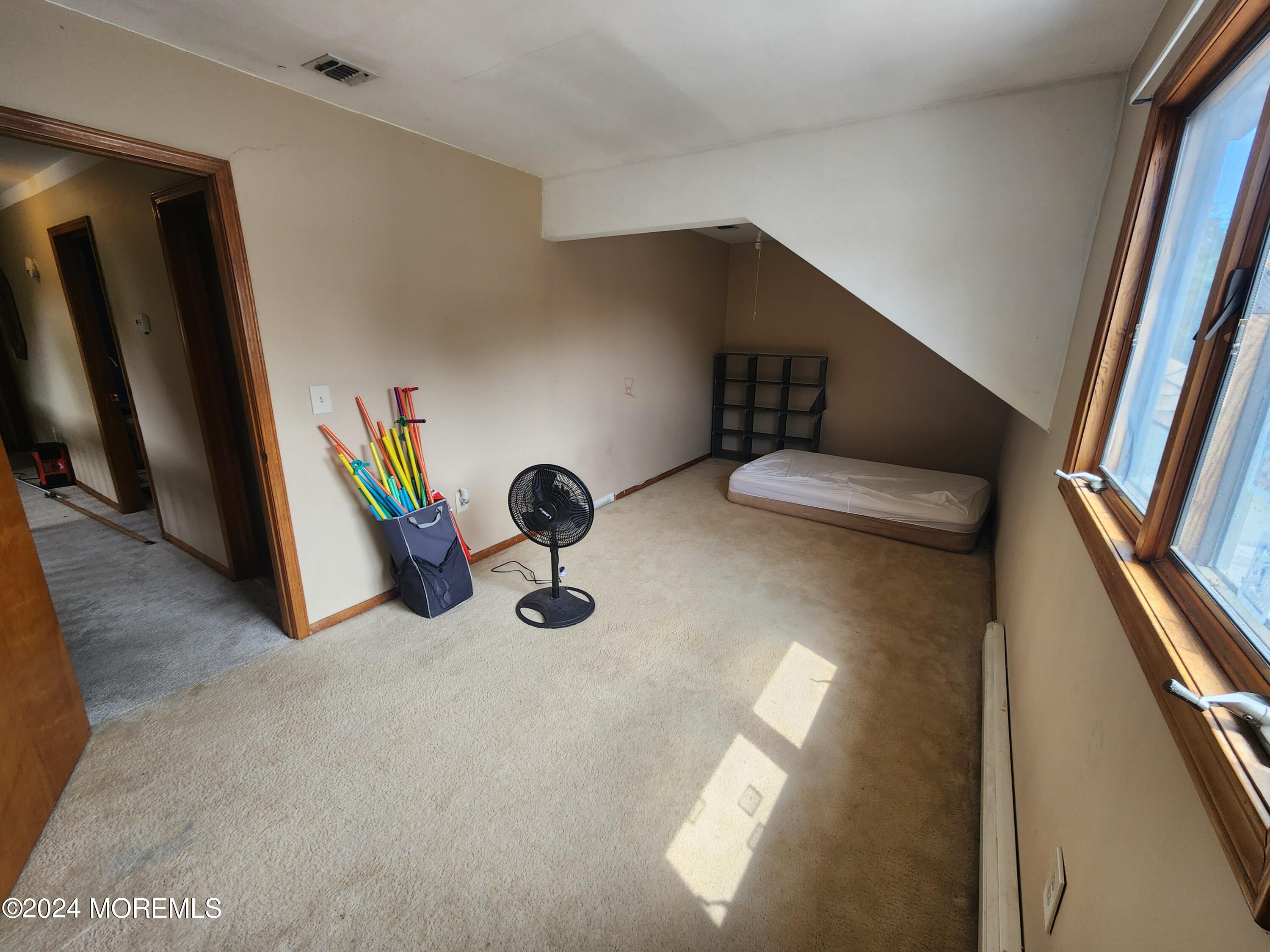 1850 Lakeside Drive South Forked River, NJ 08731 - Photo 20 of 54 a view of a livingroom with furniture and staircase