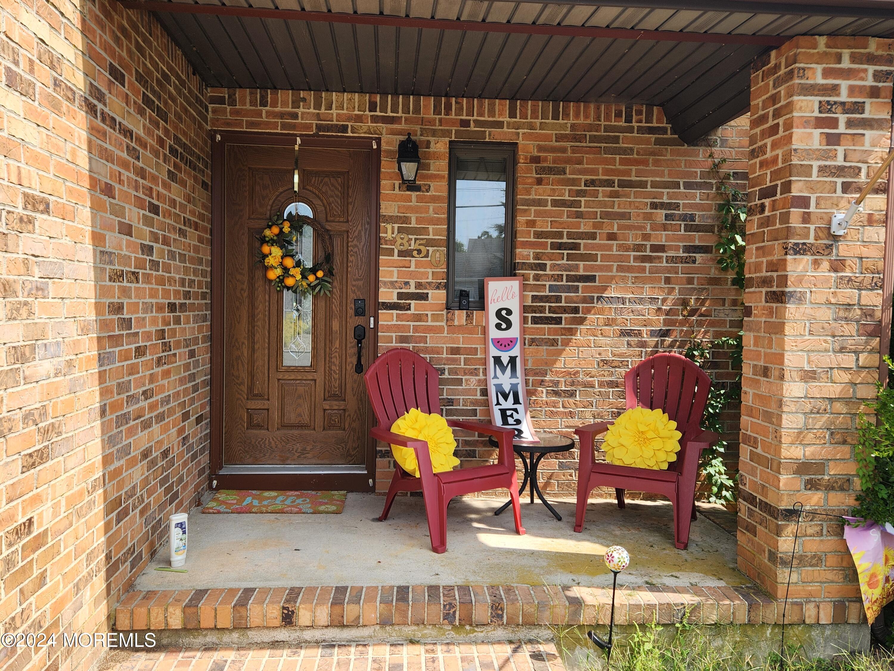 1850 Lakeside Drive South Forked River, NJ 08731 - Photo 2 of 54 a building outdoor space with patio furniture and potted plants
