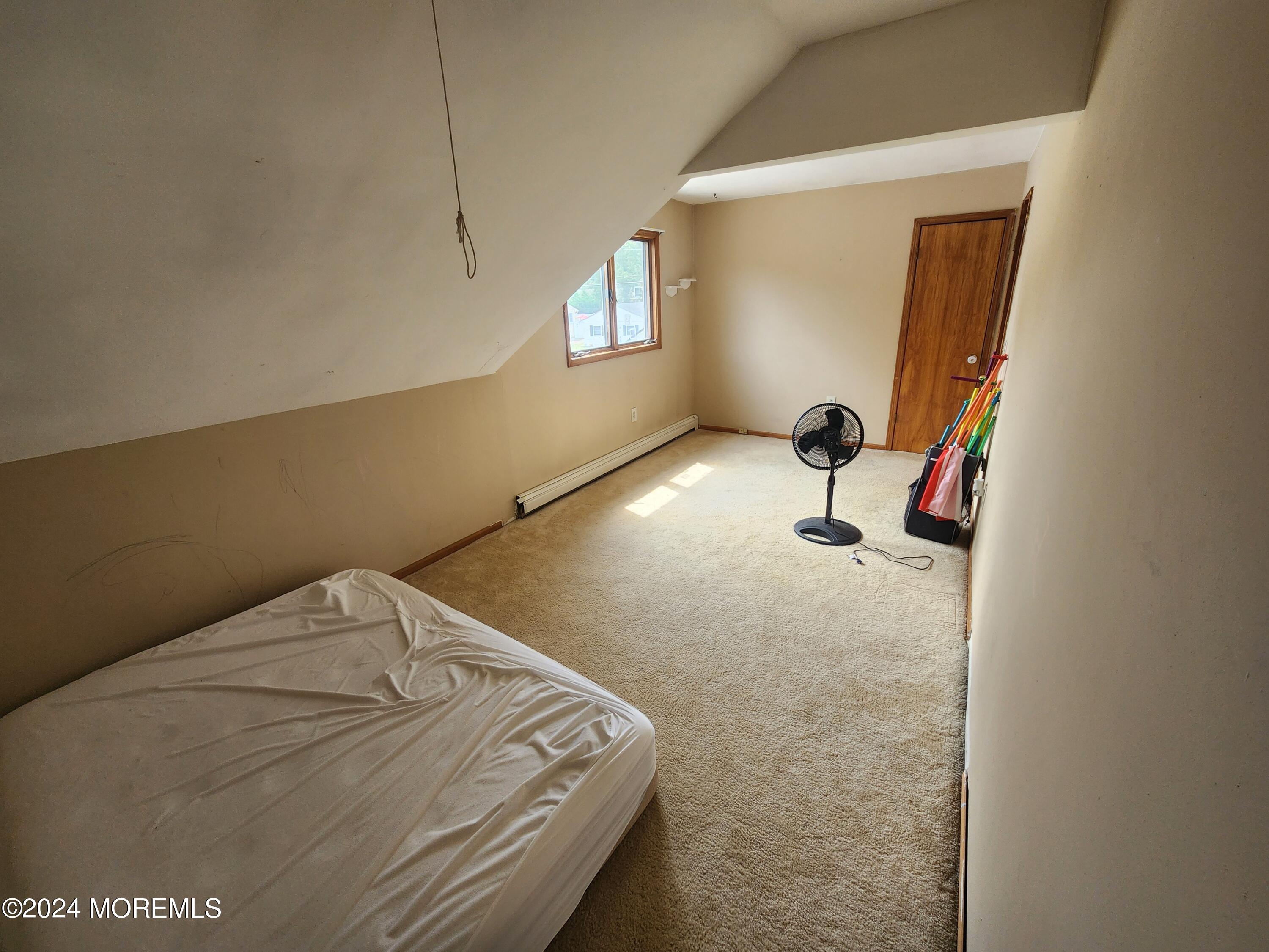 1850 Lakeside Drive South Forked River, NJ 08731 - Photo 21 of 54 a bedroom with a bed and window