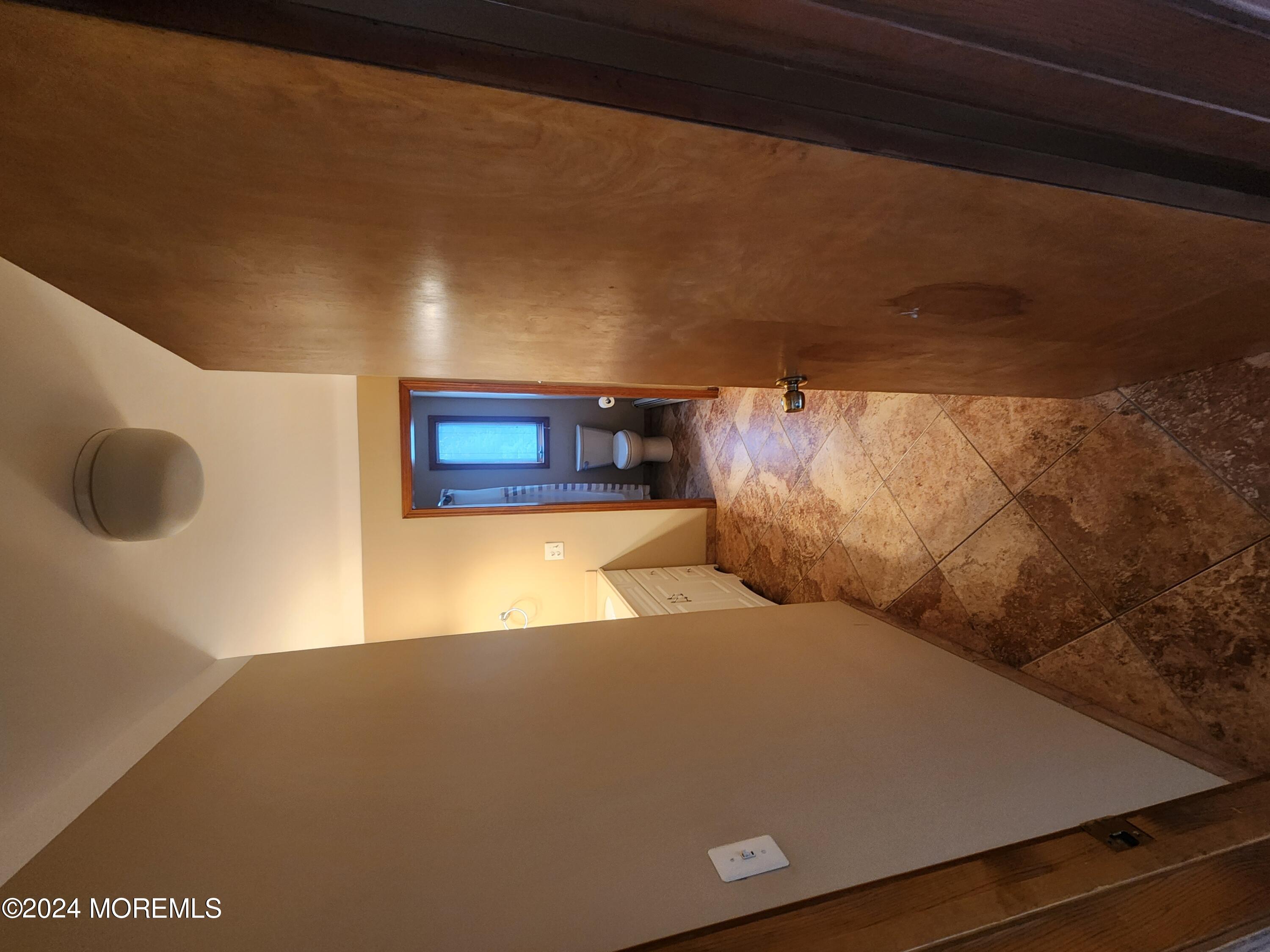 1850 Lakeside Drive South Forked River, NJ 08731 - Photo 22 of 54 a view of a big room with wooden floor