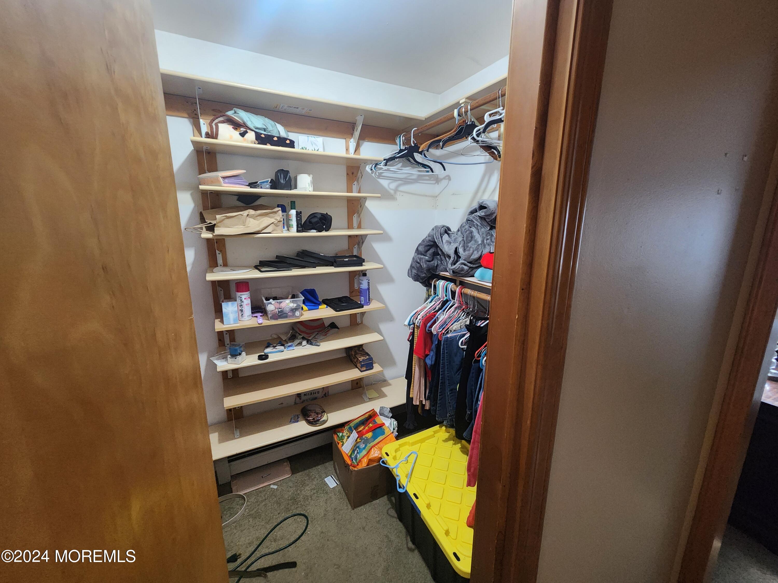1850 Lakeside Drive South Forked River, NJ 08731 - Photo 35 of 54 a view of walk in closet with clothes and shoes