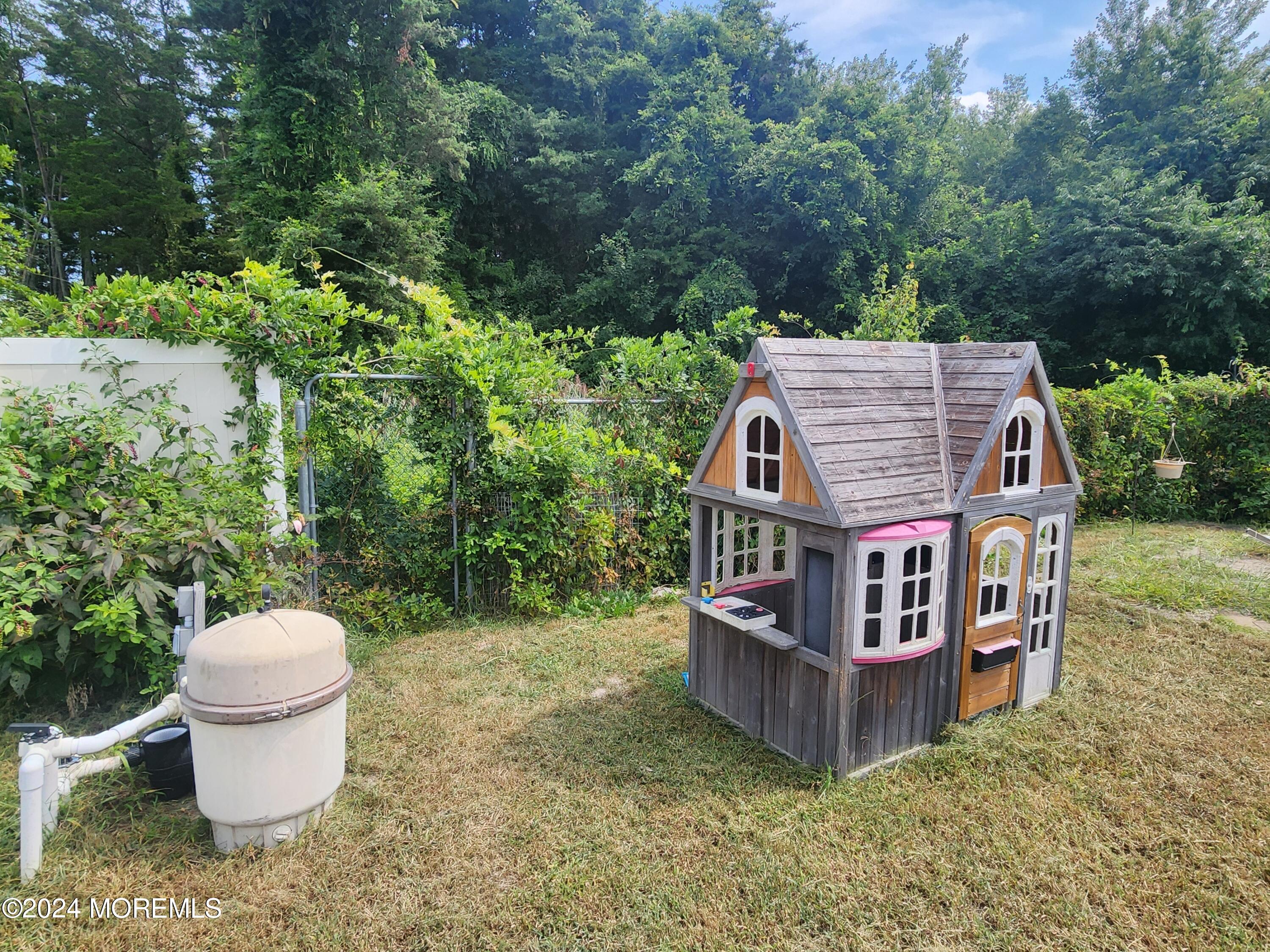 1850 Lakeside Drive South Forked River, NJ 08731 - Photo 50 of 54 a view of a house with backyard and sitting area