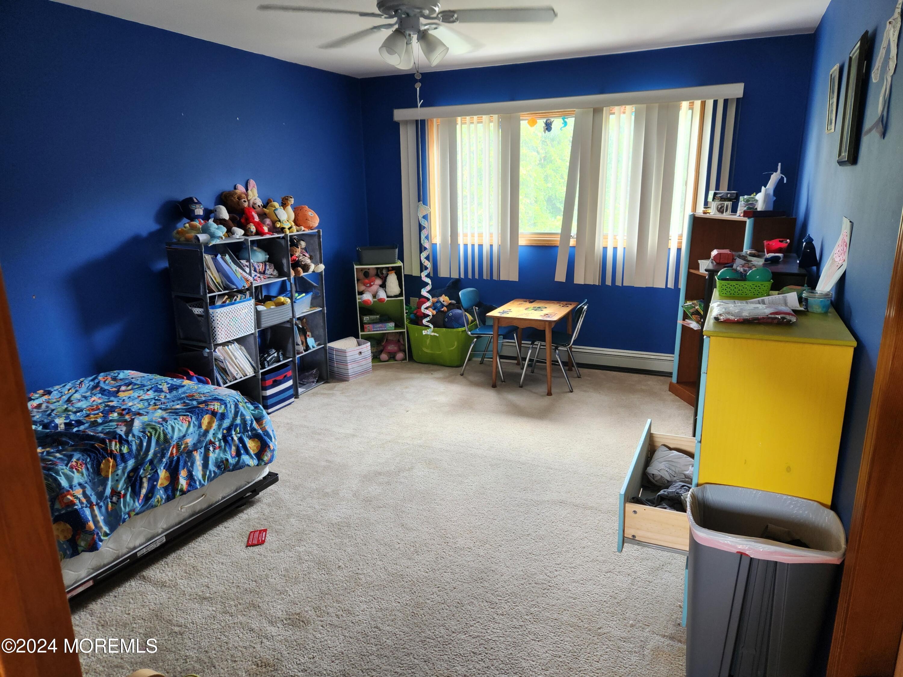 1850 Lakeside Drive South Forked River, NJ 08731 - Photo 6 of 54 a bedroom with a bed and a window