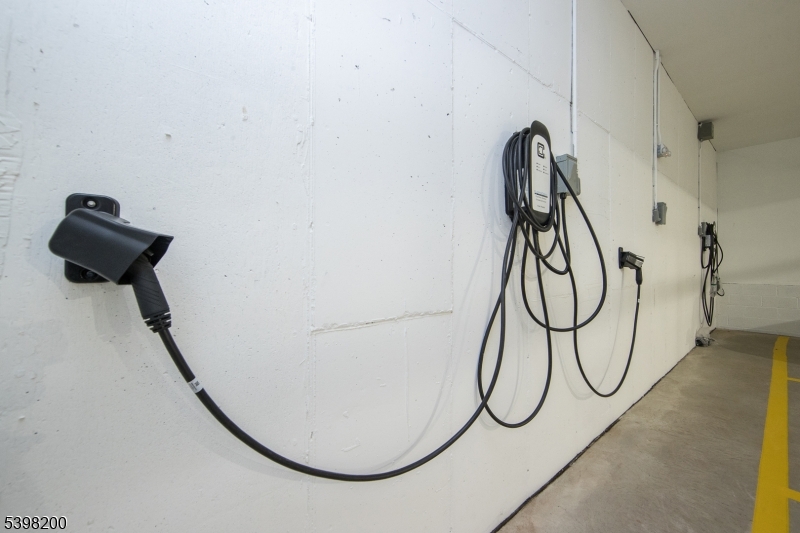 2435 Lamington Road, Unit 18 Bedminster, NJ 07921 - Photo 10 of 13 a bathroom with a glass shower door