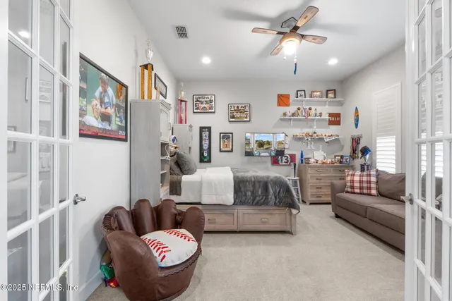 a view of a two chairs in the balcony