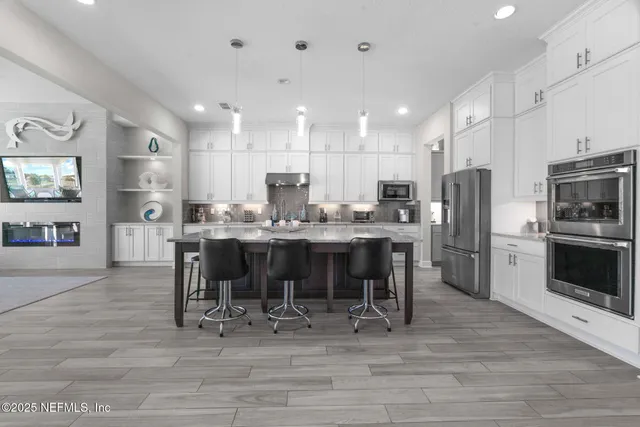 a view of a swimming pool and lounge chair