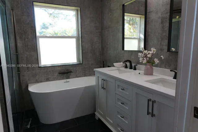 a bathroom with a sink and a bathtub