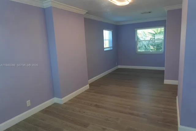 an empty room that has a window