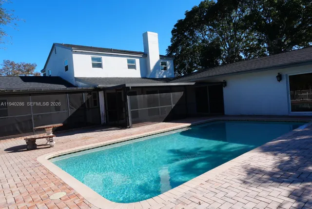 a view of a backyard with a small cabin