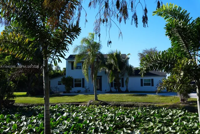 a house view with a garden space