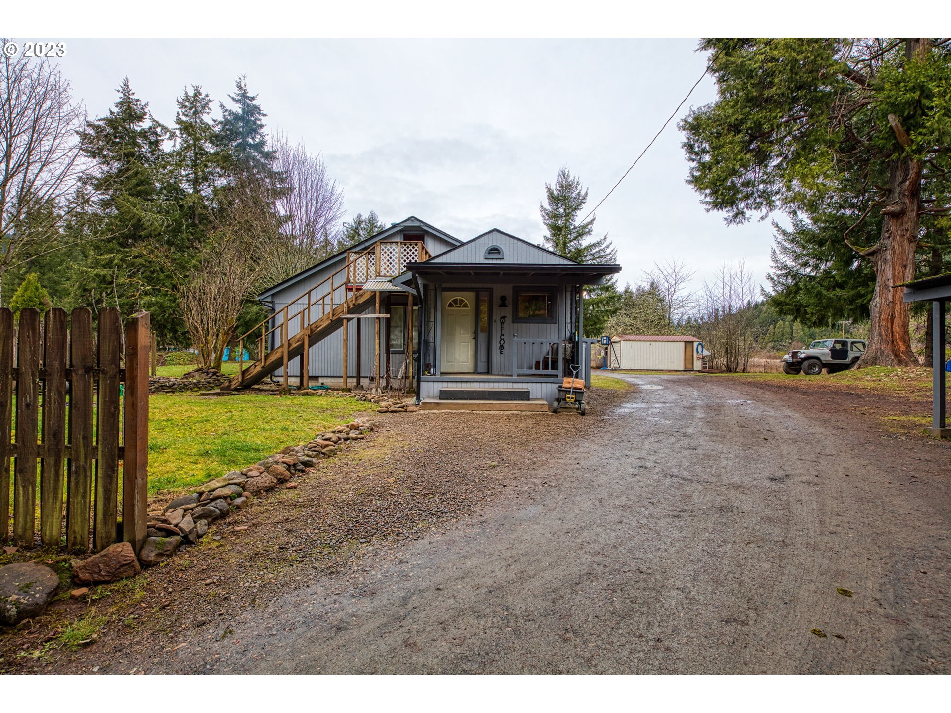 38211 Row River Road Dorena, OR 97434 - Photo 23 of 32 a view of a park with swings and slides