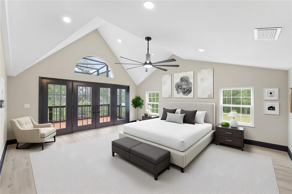 14728 Henson Road Orlando, FL 32832 - Photo 67 of 79 a spacious bedroom with a bed couch and a large window