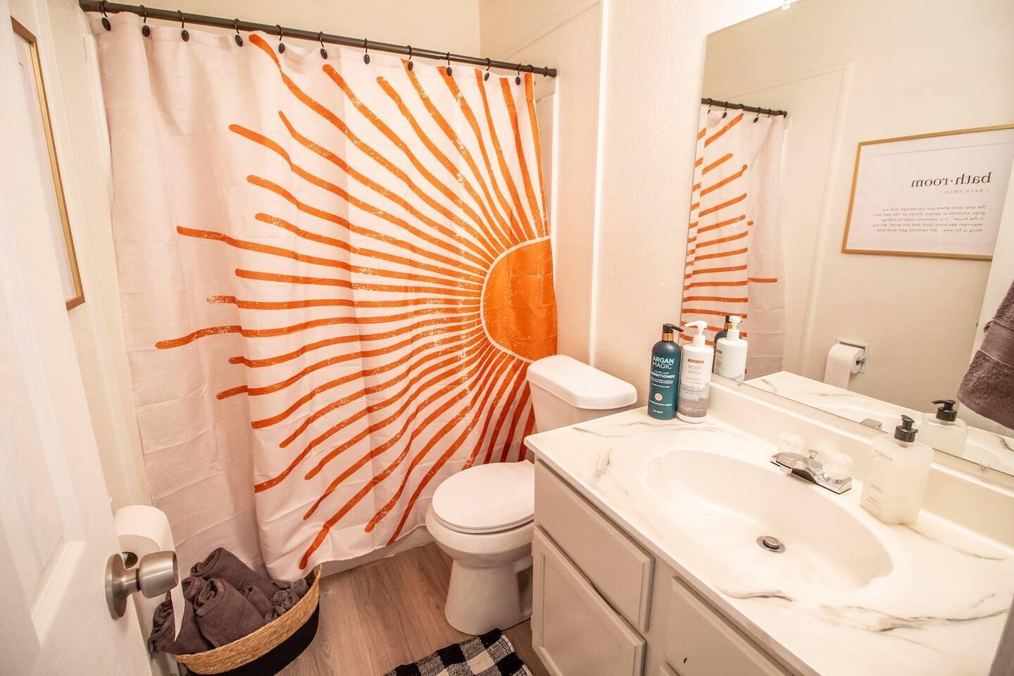5806 6th Street, Unit B Lubbock, TX 79416 - Photo 38 of 45 a bathroom with a sink toilet and mirror