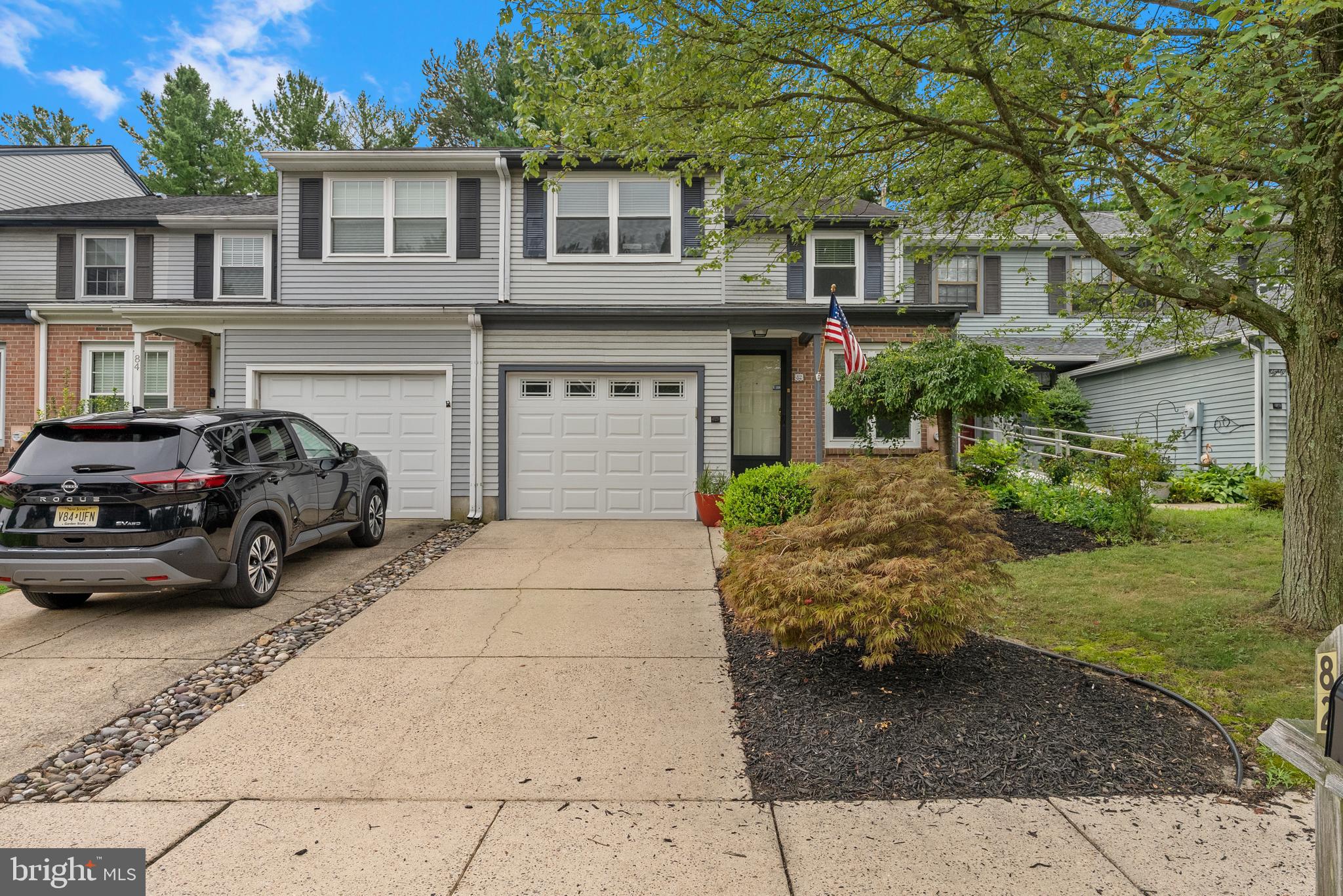 82 Farnwood Road Mount Laurel, NJ 08054 - Photo 1 of 22 a view of a car parked in front of a house