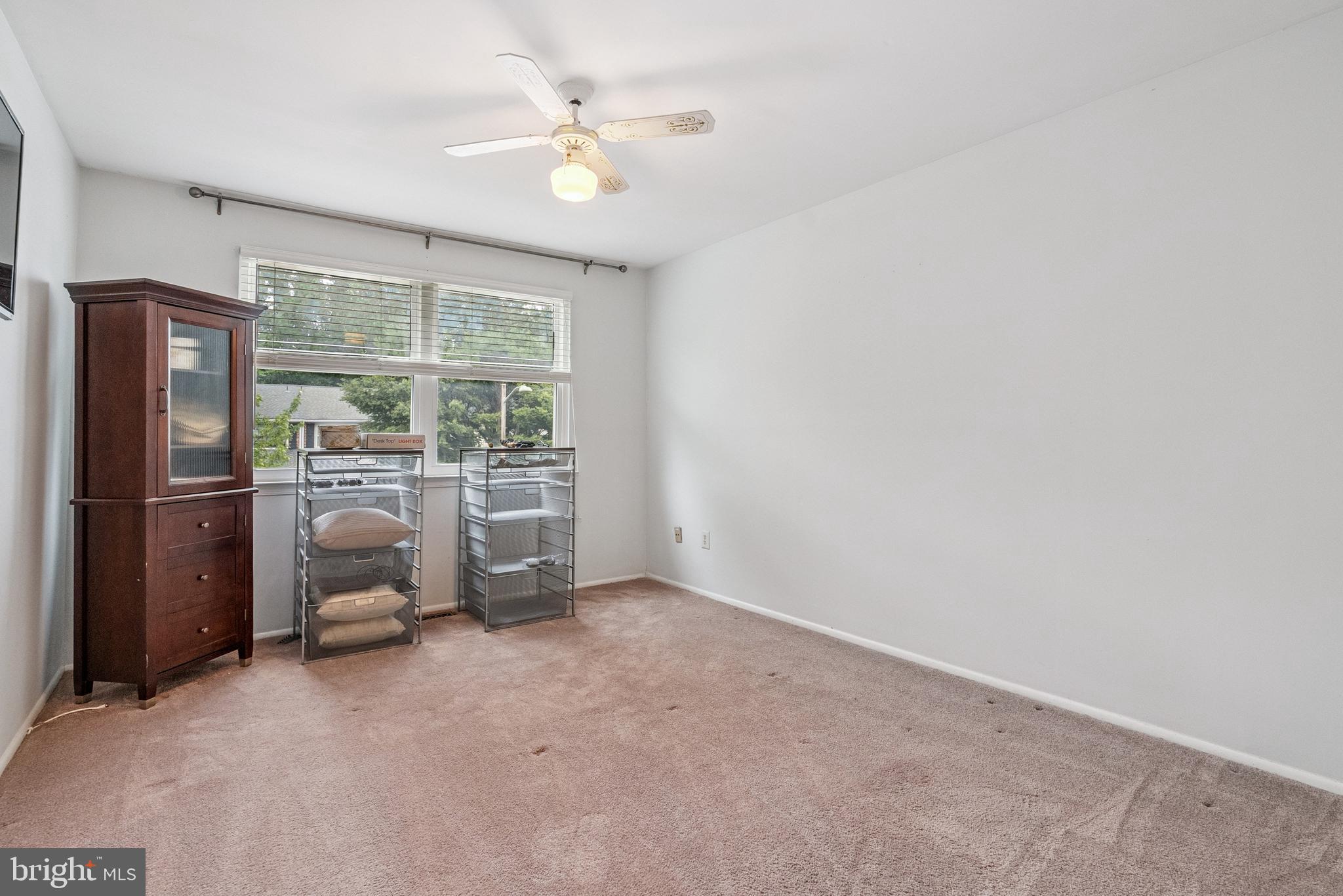 82 Farnwood Road Mount Laurel, NJ 08054 - Photo 13 of 22 an empty room with a fireplace and a window