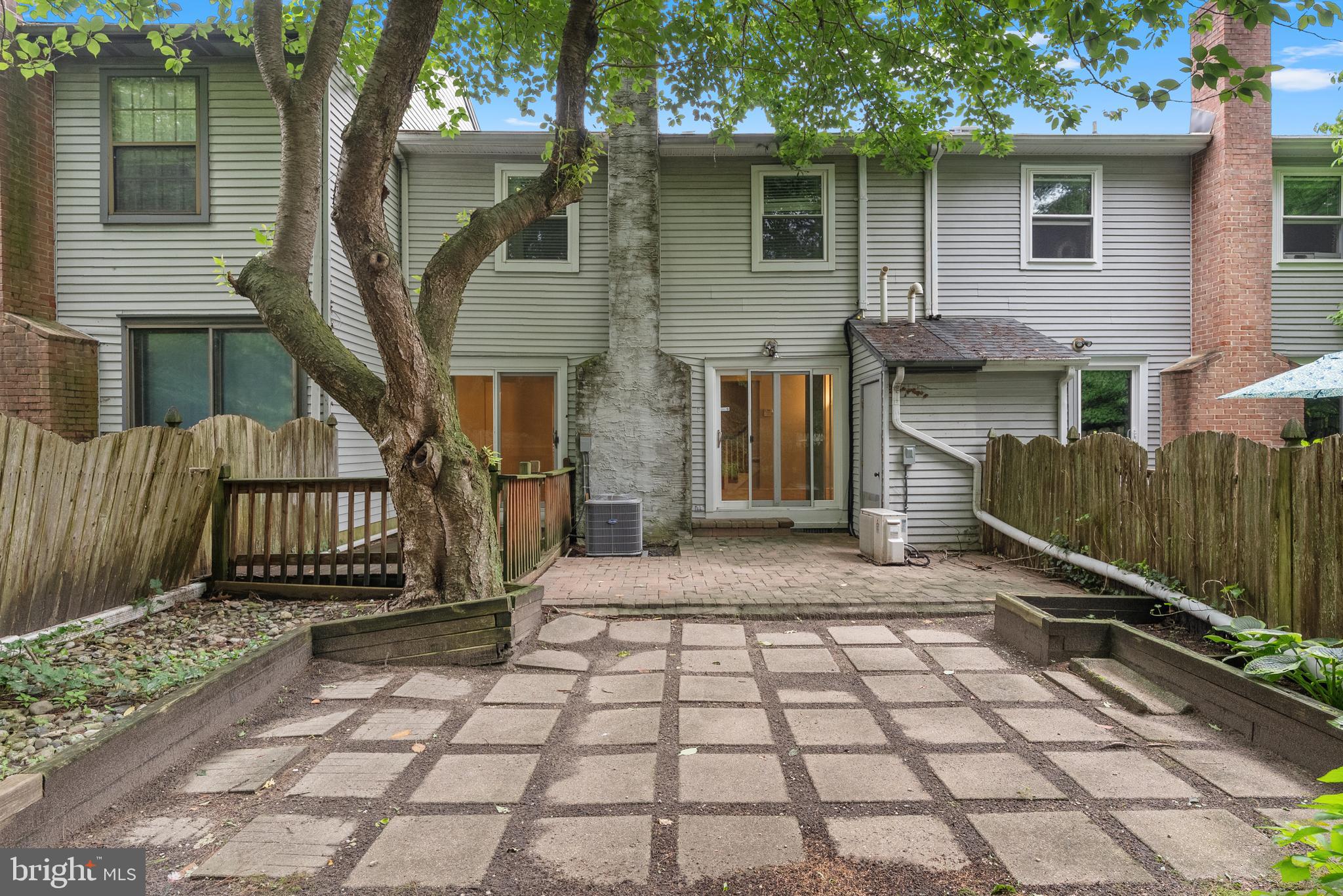 82 Farnwood Road Mount Laurel, NJ 08054 - Photo 22 of 22 a view of a house with a small yard and large tree beside it